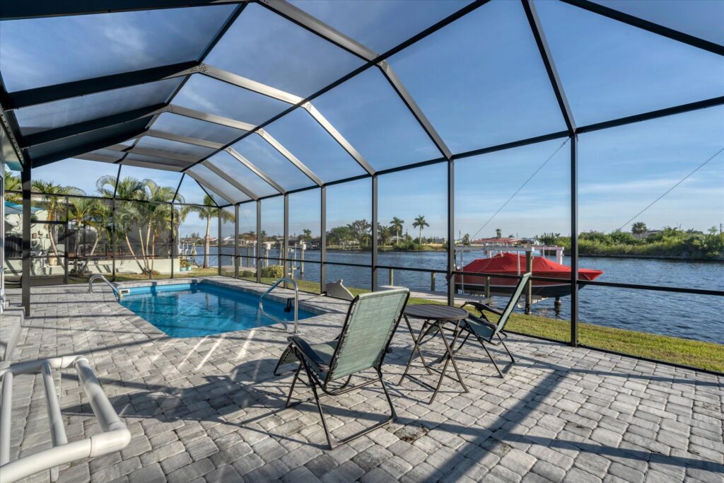 Pool and canal from a Charlotte Harbor vacation rental